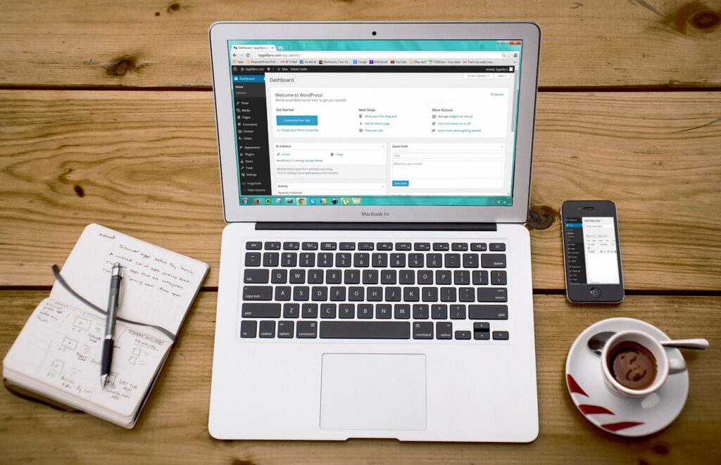 Modern business workspace with laptop and branding materials