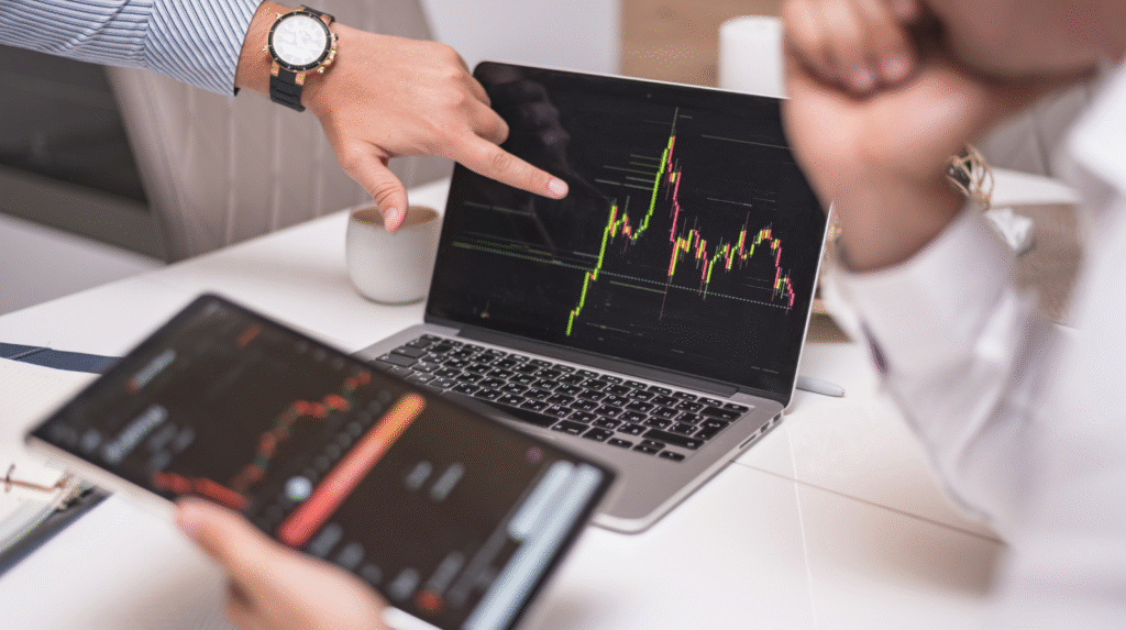 What Is Trading? A Complete Guide for Beginners Beginner trader analyzing charts and learning how to trade stocks, forex, and crypto online.